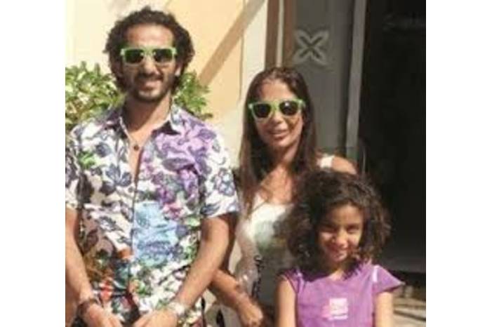 خلاف بين أحمد حلمي ومنى زكي بسبب إبنتهما لى لي