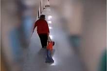 teacher-dragging-student