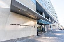 imf-entrance-with-sign-of-international-monetary-fund--concrete-architecture-building-wall-security-guard-doors-941515476-4daf802014f94722b34c54bde70133e5