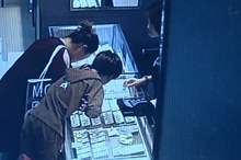 13536516-7032795-CCTV_from_the_shop_released_by_Pear_Video_shows_Guo_taking_his_m-a-14_1557991589619
